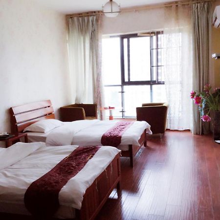 Nissi Holiday Hotel Kunming Bagian luar foto
