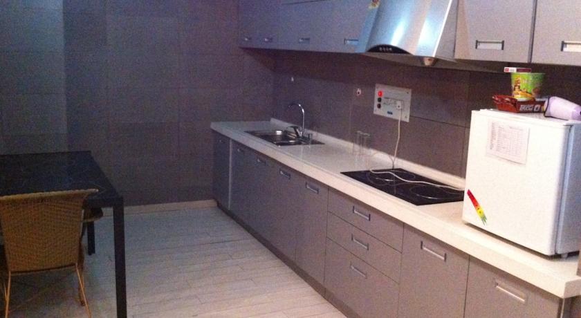 Nissi Holiday Hotel Kunming Ruang foto