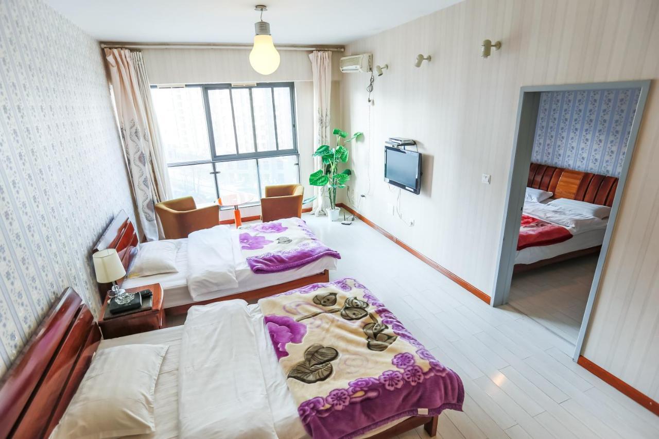 Nissi Holiday Hotel Kunming Bagian luar foto