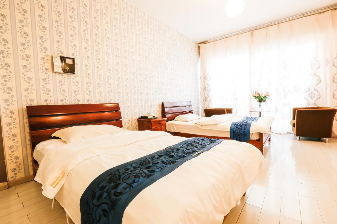 Nissi Holiday Hotel Kunming Bagian luar foto