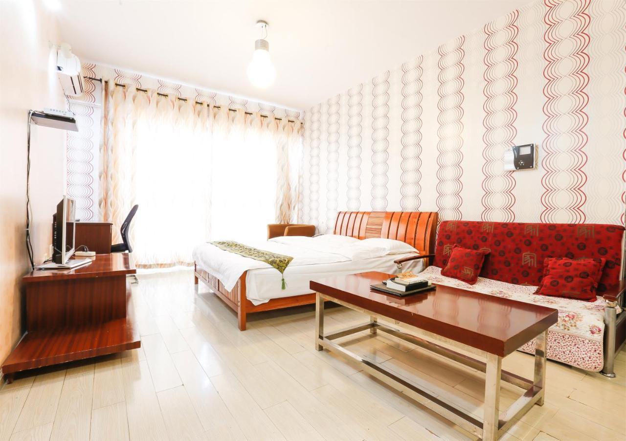 Nissi Holiday Hotel Kunming Bagian luar foto