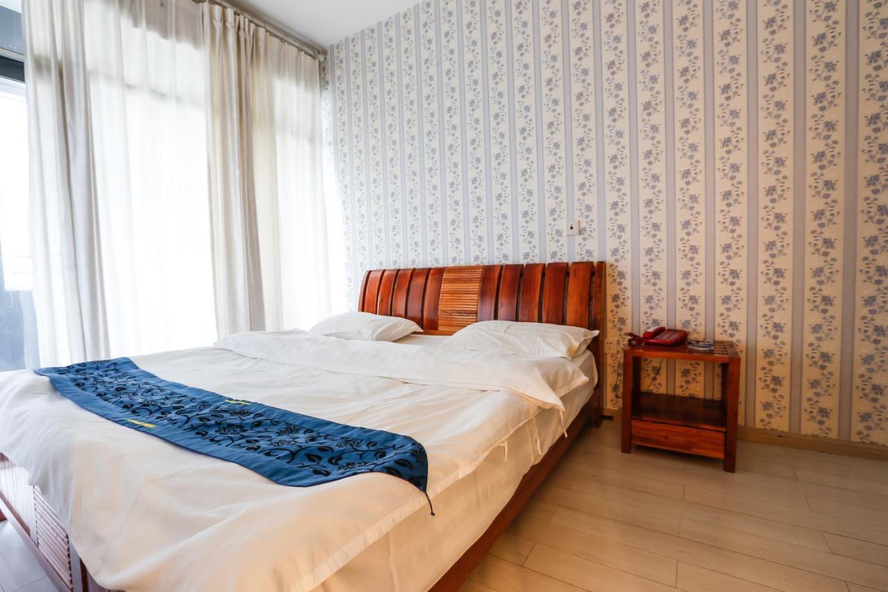 Nissi Holiday Hotel Kunming Bagian luar foto